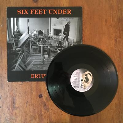 Tumnagel för auktion "Six Feet Under - Eruption LP | heavy metal hårdrock"