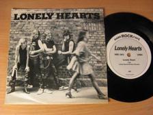 Tumnagel för auktion "Lonely Hearts. Lonely Heart/One more Night. 1984 Hard Rock Cafe."