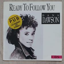 Tumnagel för auktion "DANA DAWSON READY TO FOLLOW YOU. FRANSK PRESS 1988"