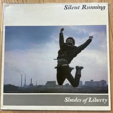 Tumnagel för auktion "SILENT RUNNING – Shades Of Liberty - LP - uk -84 - RUN 1 - arena rock"