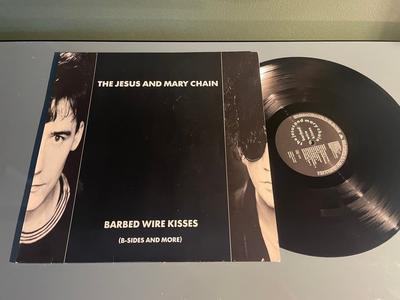 Tumnagel för auktion "JESUS AND MARY CHAINS barbed wire kisses 1st PRESS INDIE ALTERNATIVE ROCK LP"