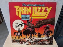 Tumnagel för auktion "Thin Lizzy - The adventures of Thin Lizzy"