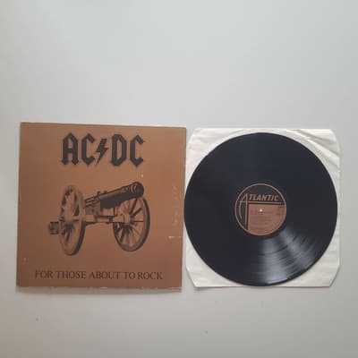 Tumnagel för auktion "AC/DC - FOR THOSE ABOUT TO ROCK CANADA PRESS"
