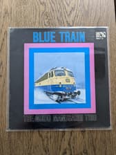 Tumnagel för auktion "The Guido Manusardi Trio - Blue Train"