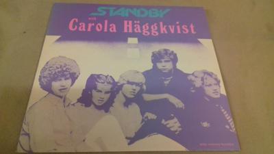 Tumnagel för auktion "STANDBY with CAROLA HÄGGKVIST - LP - 1983 - ROSA HONUNG RECORDS "