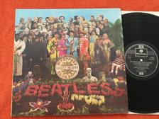 Tumnagel för auktion "THE BEATLES Sgt Pepper's lonely hearts club band LP re UK PARLOPHONE PCS 7027"