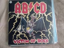 Tumnagel för auktion "AB/CD victim of rock LP vinyl"