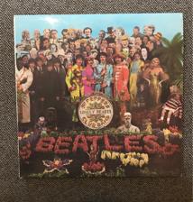 Tumnagel för auktion "Sgt. Peppers lonely hearts club band LP + cut outs "