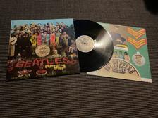 Tumnagel för auktion "LP THE BEATLES SGT PEPPER'S LONELY HEARTS CLUB BAND PARLOPHONE UK PCS 7027"