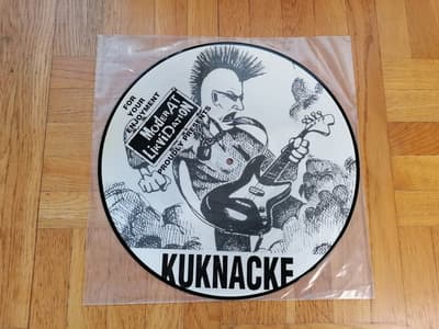 Tumnagel för auktion "Moderat Likvidation – Kuknacke, Picture disc 12" (Distortion Records, 1996) Punk"