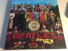 Tumnagel för auktion "The Beatles - Sgt. Pepper's Lonely Hearts Club Band, UK-press PCS 7027"