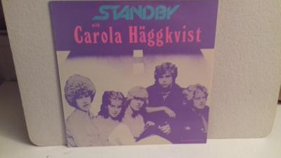 Tumnagel för auktion "STANDBY with CAROLA HÄGGKVIST - LP - 1983 - ROSA HONUNG RECORDS "