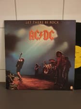 Tumnagel för auktion "AC/DC. "Let there be rock" USA 1977."