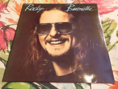 Tumnagel för auktion "ROCKY BURNETTE - SIGNERAD LP AUTOGRAF- "ROCKY BURNETTE" - 1982 ROCK!!!"