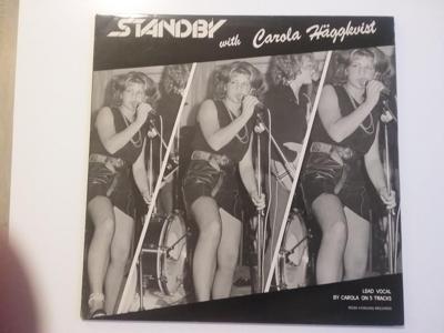 Tumnagel för auktion "STANDBY with( CAROLA HÄGGKVIST) (Hård rock)"