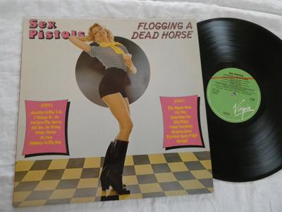 Tumnagel för auktion "Sex Pistols Flogging A Dead Horse Virgin V 2142 1979"