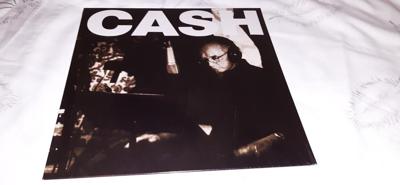 Tumnagel för auktion "Cash - An American recording V - A hundred highways , Ny och inplastad"