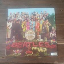 Tumnagel för auktion "The Beatles-  Sgt. Pepper's Lonely Hearts Club Band 1C 072 04 177  Reissue Germa"