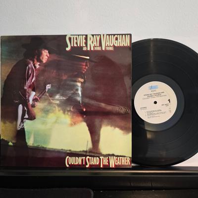 Tumnagel för auktion "STEVIE RAY VAUGHAN AND DOUBLE TROUBLE - COULDN'T STAND THE WEATHER SPAIN 1990"