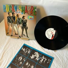 Tumnagel för auktion "Vinyl LP - Rocky Sharpe & The Replays - Rock-It-To-Mars"