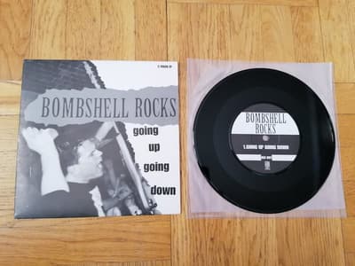 Tumnagel för auktion "Bombshell Rocks – Going Up Going Down, 7" (Noiseline, 1998)"
