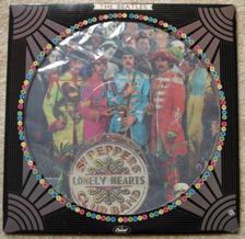 Tumnagel för auktion "Bild-skiva Beatles-Sgt.Pepper lonely hearts club band (Usa) Capitol,picture disc"