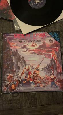 Tumnagel för auktion "Heavy load metal conquest Vinyl Ep, 12!"