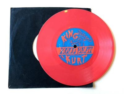Tumnagel för auktion "King Kurt ”Zulu Beat” 1983 Ljusröd Vinyl RARE DIY Debuten"