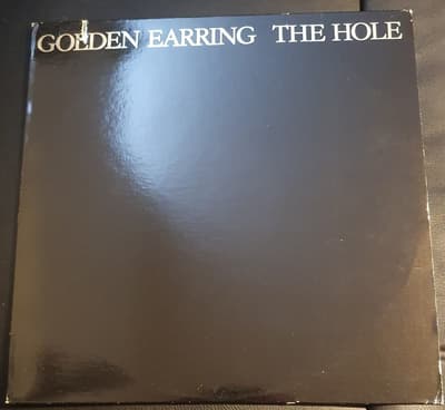 Tumnagel för auktion "GOLDEN EARRING – The Hole"