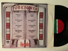 Tumnagel för auktion "FOREIGNER Made in Mexico Vinyl LP POP ROCK hårdrock"