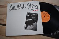 Tumnagel för auktion "Little Bob Story Live LP + 7" pop rock garage"