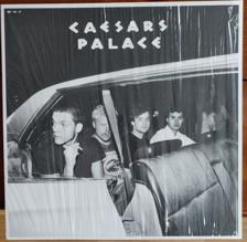 Tumnagel för auktion "CAESARS PALACE - ¡Rock De Puta Mierda! Lp, gul vinyl LIMITERAD"