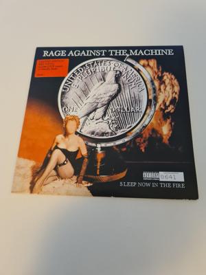 Tumnagel för auktion "Rage Against The Machine -Sleep Now In The Fire - 7" (2000) Numrerad, röd vinyl!"