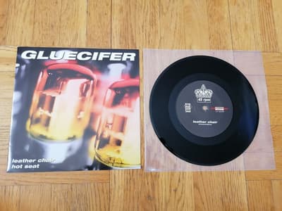 Tumnagel för auktion "Gluecifer – Leather Chair / Hot Seat, 7" (White Jazz Records, 1997)"