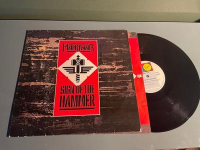 Tumnagel för auktion "MANOWAR sign of the hammer KLASSISK HÅRDROCK METAL 10 records LP"