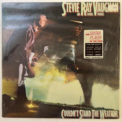 Tumnagel för auktion "STEVIE RAY VAUHAN AND DOUBLE TROUBLE couldn't stand the weather LP -84 US"