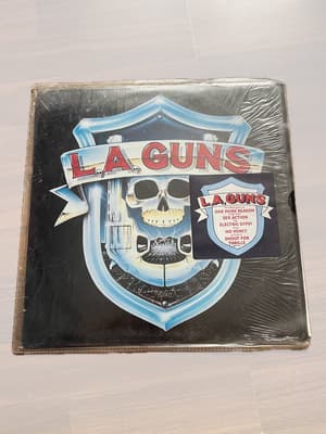 Tumnagel för auktion "L.A. GUNS 1998 Vertigo"