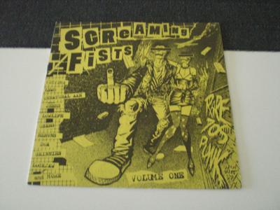 Tumnagel för auktion "V/A - Screaming Fists Volume 1 [ THE LEWD THE SKINNIES D.O.A. VICTIMS ]  EX"