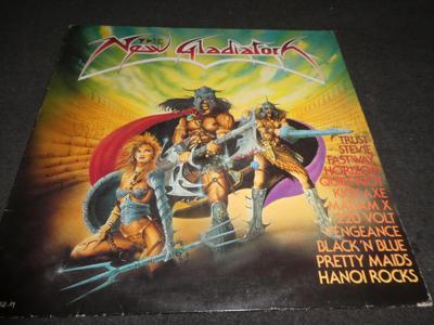 Tumnagel för auktion "The new gladiator - NED LP - 1985 - Black Sabbath/Hanoi Rocks/220 Volt"