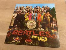 Tumnagel för auktion "The Beatles - Sgt. Pepper’s / Peppers lonely hearts club band - Ospelad"