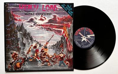 Tumnagel för auktion "** Heavy Load - Metal Conquest **"