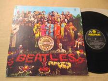 Tumnagel för auktion "The Beatles "Sgt. Peppers Lonely Hearts Club Band""