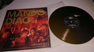 Tumnagel för auktion "Mando Diao - Hurricane Bar Lp Gatefold Gold vinyl Ltd500x"