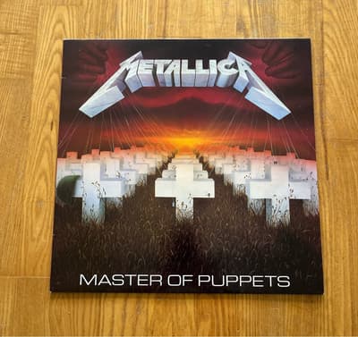 Tumnagel för auktion "Metallica- Master of puppets - Uk/Eur original -86 i fantastiskt skick !!!"