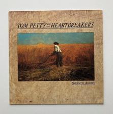 Tumnagel för auktion "TOM PETTY AND THE HEARTBREAKERS "Southern accents" Rock LP"