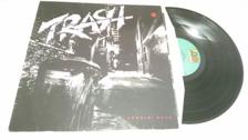 Tumnagel för auktion "Trash - Burnin' Rock LP"