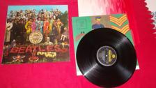 Tumnagel för auktion "The Beatles "Sgt peppers lonely hearts club band" LP"