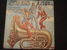 Tumnagel för auktion "45 - BEE GEES & PETER FRAMPTON. Sgt. Peppers Lonely Hearts Club Band. 1978"