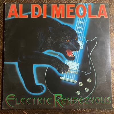 Tumnagel för auktion "AL DI MEOLA - Electric Rendezvous 1982. "Gitarrhjälte” JAN HAMMER PROG-ROCK. LP"