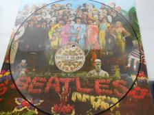 Tumnagel för auktion "LP PICTUREDISC THE BEATLES - SGT. PEPPER´S LONELY HEARTS CLUB BAND"